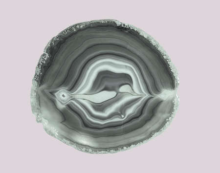 Backlight shotting of a agate crystal cross section with isolated on white background.の写真素材