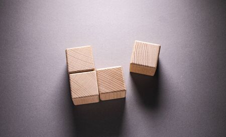 Wooden Geometric Shapes Cube on a paper background , This can use for past your wordsの写真素材