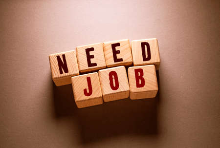 Need Job Word Written on Wooden Cubesの写真素材