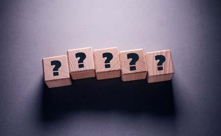 Question Mark Word Written on Wooden Cubesの写真素材