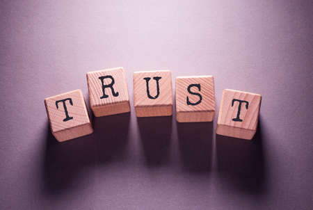 Trust Word Written on Wooden Cubesの写真素材