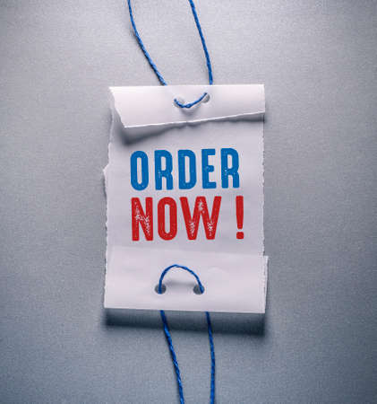 Text sign showing Order Now. Conceptual photo confirmed request by one party to another to buy sell Empty Sticker Tags Tied With A String For Information Label Signageの写真素材