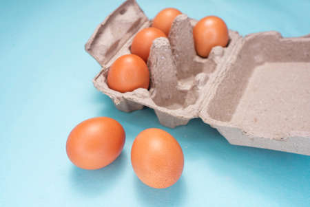 Close up of fresh Chicken brown eggs on tableの写真素材