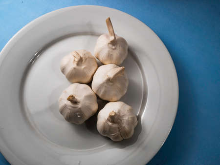 Close up of fresh garlic on tableの写真素材