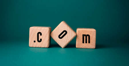 CMS, Content Management System acronym on wooden cubes on green backgroundの写真素材