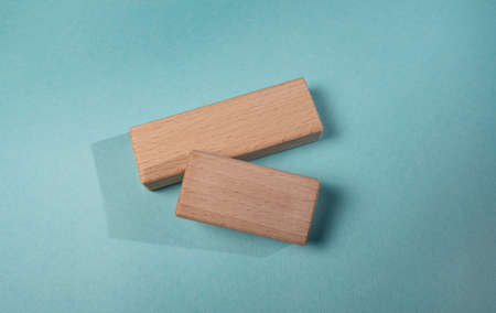 Wooden blocks on a blue background. Top view, flat lay.の写真素材