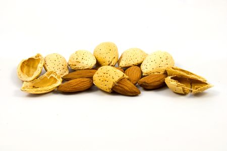 group of almonds isolated on whiteの写真素材