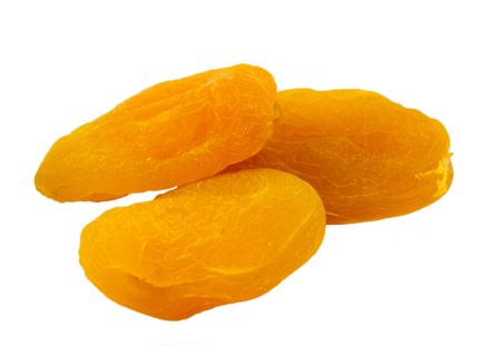 dried apricots isolated on white backgroundの写真素材