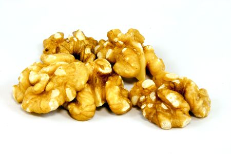 Walnuts kernels isolated on whiteの写真素材