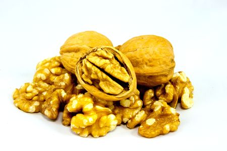 Walnuts in shell and kernels isolated on whiteの写真素材
