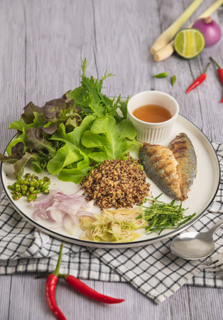 Quinoa Mackerel Salad with Thai ingredient Sour and spicy foodの写真素材