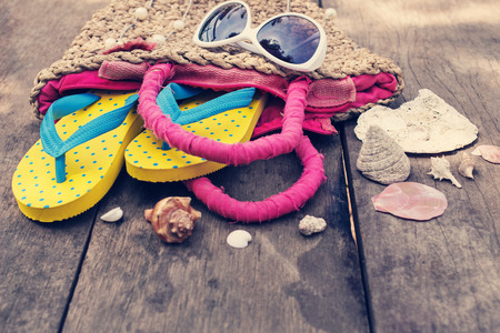 Beach accessories on old wooden backgroundの写真素材
