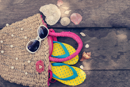 Beach accessories on old wooden backgroundの写真素材