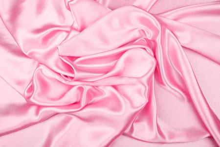 Pink luxury satin fabric texture for backgroundの写真素材