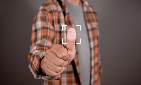 Fingerprint scanning provides secure access with biometric identification, business technology, internet security, surveillance and security scanning of digital programs cyber futuristic applications.の写真素材