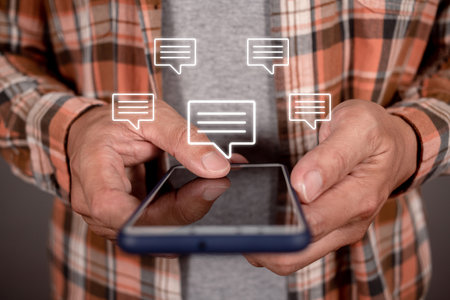 Man hand press smartphone with letter signs icon. Concept communication network.の写真素材