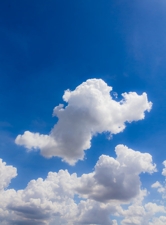 Blue sky and clouds verticalの写真素材