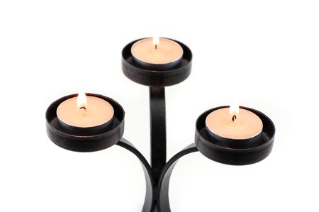modern black metal candle holder on white backgroundの写真素材