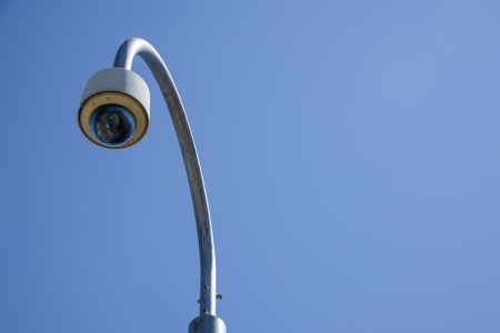 dome type camera over the blue sky の写真素材