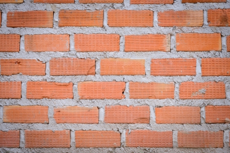  house wall under construction with red bricks の写真素材