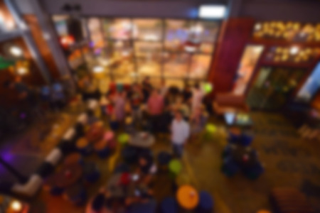 blurred people in restaurant of night partyの写真素材