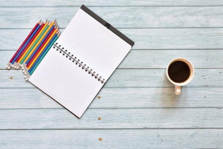 Still life, business office supplies education concept, Top view image of open notebook with coffee...