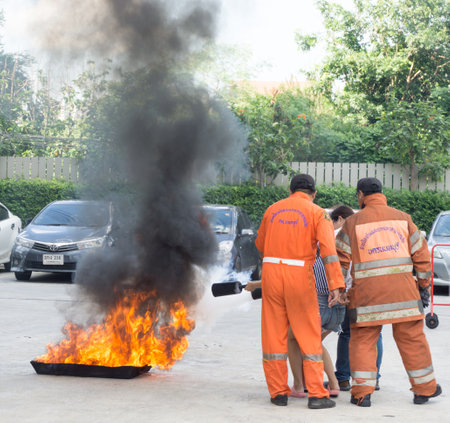 BANGKOK, THAILAND- JULY 31: Fire training by a firefighter on July 31, 2016 in Bangkok, Thailand.のeditorial素材