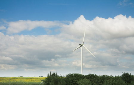 wind turbine on blue skyの写真素材