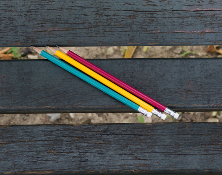 pencil over wooden background.の写真素材