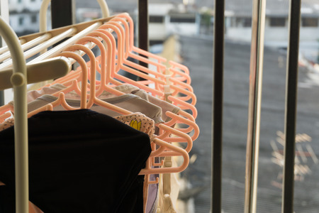 Bra drying clothes with sun at the balcony condominium.の写真素材