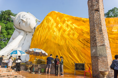 ANGTHONG, THAILAND - APRIL 14, 2017 : Wat Khun Inthapramun is ancient temple,The largest and longest reclining Buddha statue in Thailand.のeditorial素材