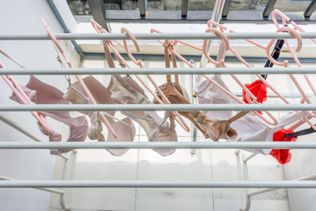 Bra drying clothes with sun at the balcony condominiumの写真素材