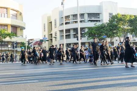 BANGKOK, THAILAND - 21 OCTOBER 2017 : People walking crossing the road in the city.