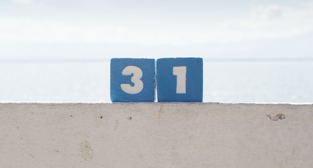 Number thirty one with blue sky background.の写真素材