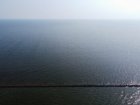 Wide dark river and River barrier, dark background.の写真素材