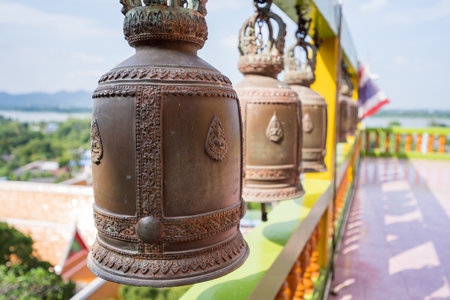 Rows of old bells at the temple.の写真素材