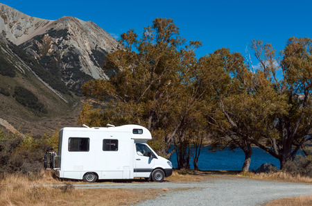 Motorhome camper at Lake Pearson / Moana Rua Wildlife Refuge located in Craigieburn Forest Park in Canterbury region, South Island of New Zealandの写真素材