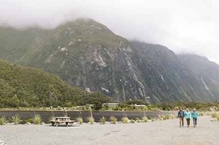 Milford Sound, New Zealand - February 2016: Tourists at Milford Sound passenger terminal pierのeditorial素材