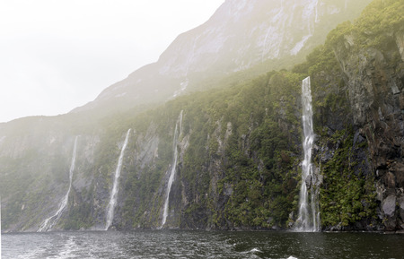 Milford Sound / Piopiotahi, a fiord in the south west of New Zealand's South Island, within Fiordland National Parkの写真素材