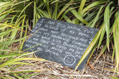Christchurch, New Zealand - February 2016: A message board written by an earthquake victim urging for home rebuildingのeditorial素材