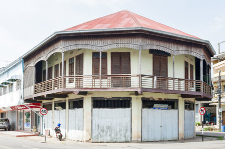 Nakhon Phanom, Thailand - May 2017: Conserved old mixed concrete and wooden shophouse in downtown Nakhon Phanom, Thailandのeditorial素材