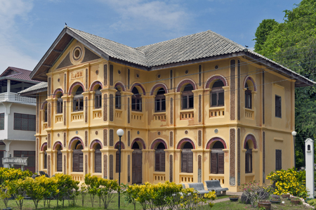 Nakhon Phanom, Thailand - May 2017: Old classic colonial-style building, home to the Edouard Namlap Foundation, located inside Saint Anna Nong Saeng Catholic Church in Nakhon Phanom Province, Thailandのeditorial素材