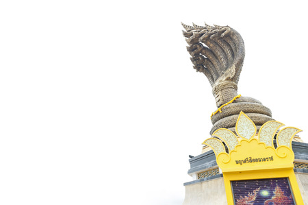 Statue of Seven-headed Serpent located by the Mekong River in downtown Nakhon Phanom, Thailand. White background with space.のeditorial素材
