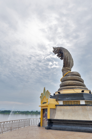 Statue of Seven-headed Serpent located by the Mekong River in downtown Nakhon Phanom, Thailand.のeditorial素材