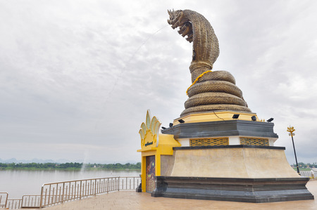 Statue of Seven-headed Serpent located by the Mekong River in downtown Nakhon Phanom, Thailand.のeditorial素材