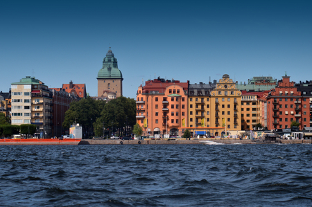 Waterside settlement full of iconic buildings at port of Kungsholmstorg brygga in Stockholm, Swedenのeditorial素材