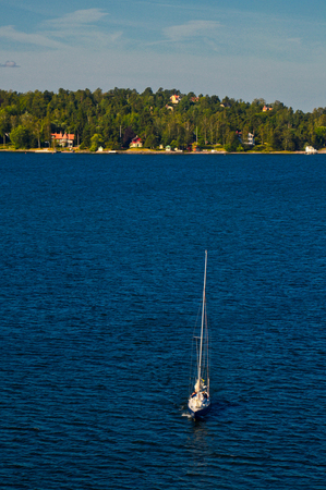 Stockholm, Sweden - July 2014: Swedish sailing in the sea of Stockholm Archipelago in Baltic Sea, Swedenのeditorial素材