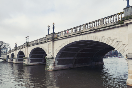 Kingston upon Thames, United Kingdom - April 2018: Kingston Bridge carrying the A308 Horse Fair Road across the River Thames in Kingston, Englandのeditorial素材