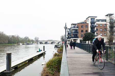 Kingston upon Thames, United Kingdom - April 2018: Riverside Walk promenade by the River Thames in...