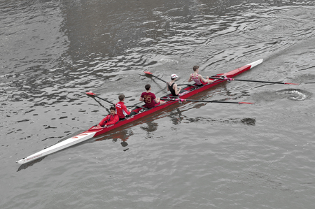 Kingston upon Thames, United Kingdom - April 2018: Oarsmen from Kingston Rowing Club training for...